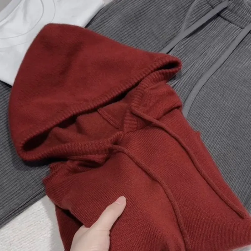 Minority Joker Pulled Cord Hooded Cashmere Knitwear Age-reducing temperament with bottoming shirt and long sleeves.