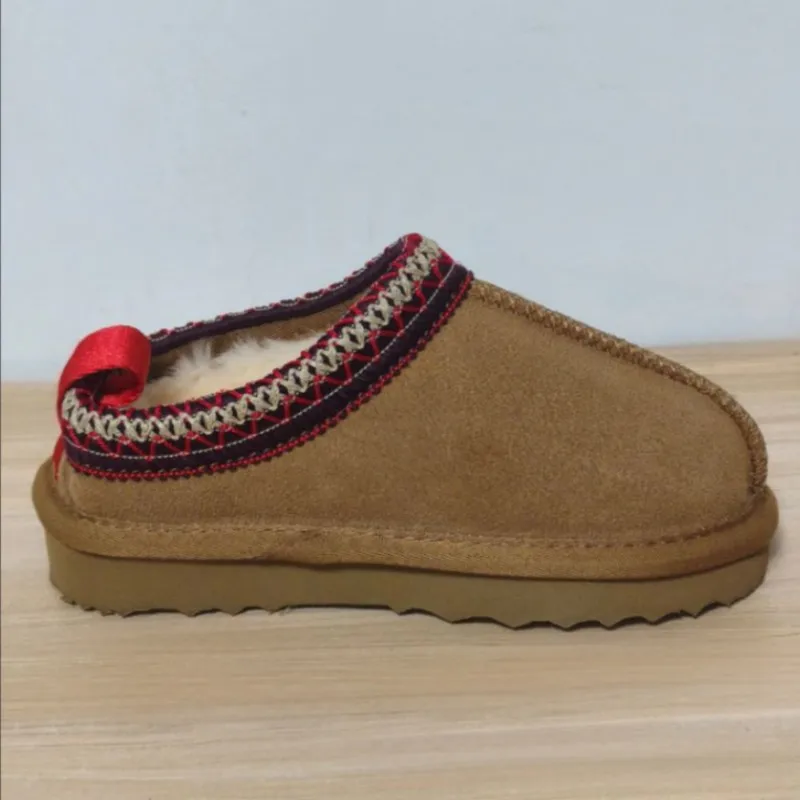 รองเท้าเด็กฤดูหนาว 2026 รุ่นใหม่ รองเท้าบูทหิมะเด็กบุขนหนานุ่ม กันลื่น รองเท้าเด็กหุ้มข้อสั้น รองเท้าผ้าฝ้ายสำหรับหิมะ ไซส์ 21-35