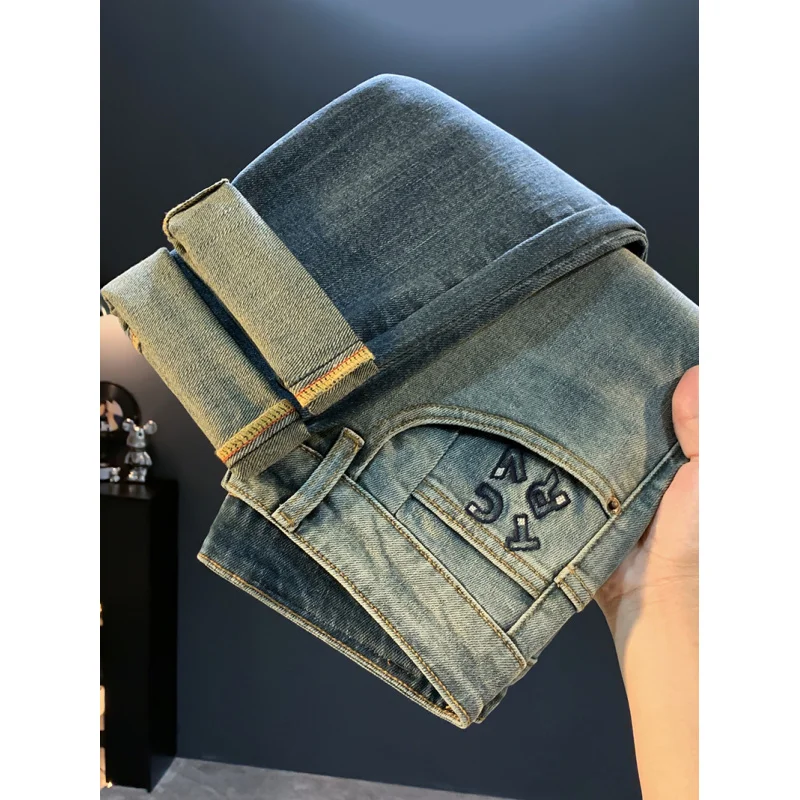 جينز عصري متدرج للرجال لخريف 2025 كاجوال مرن بقصة ضيقة وسراويل قصيرة عصرية