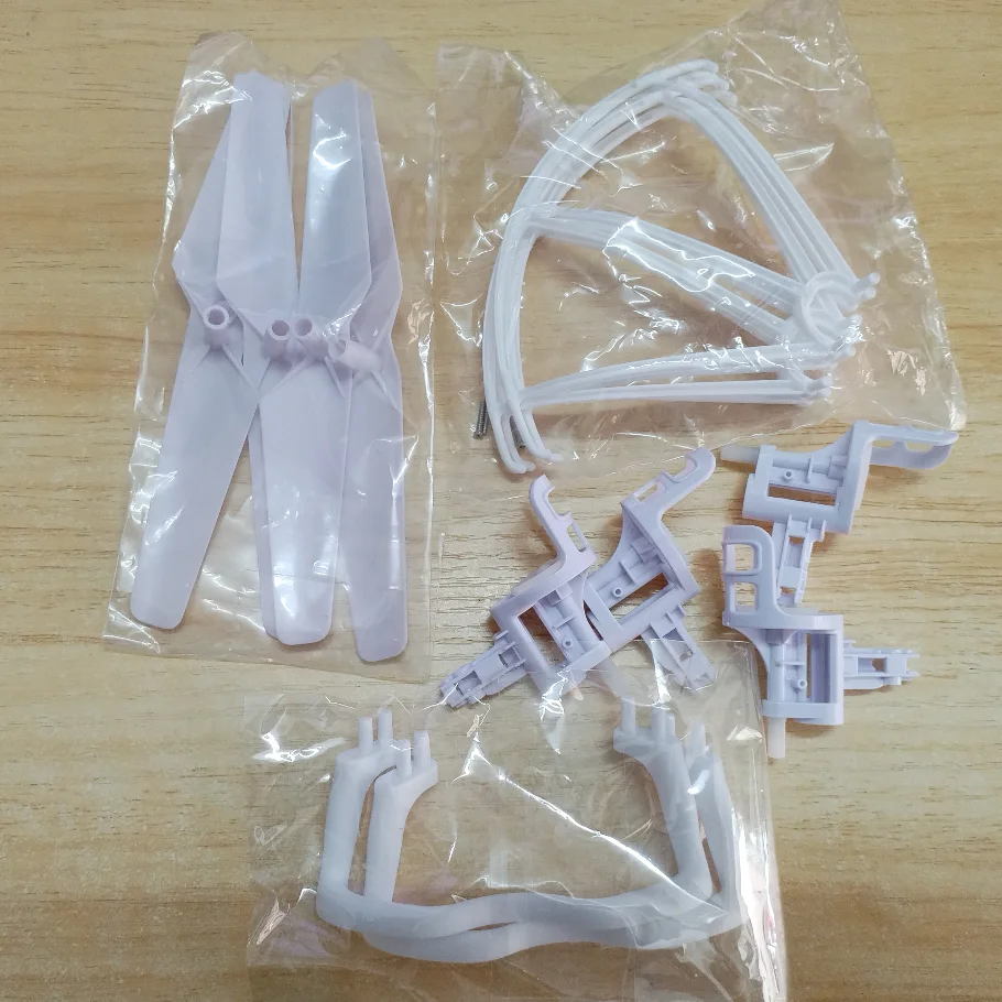 

Комплект запасных частей Syma X5 X5C включает лопасти, защитный чехол для пропеллера, сиденье двигателя с большой шестерней шасси