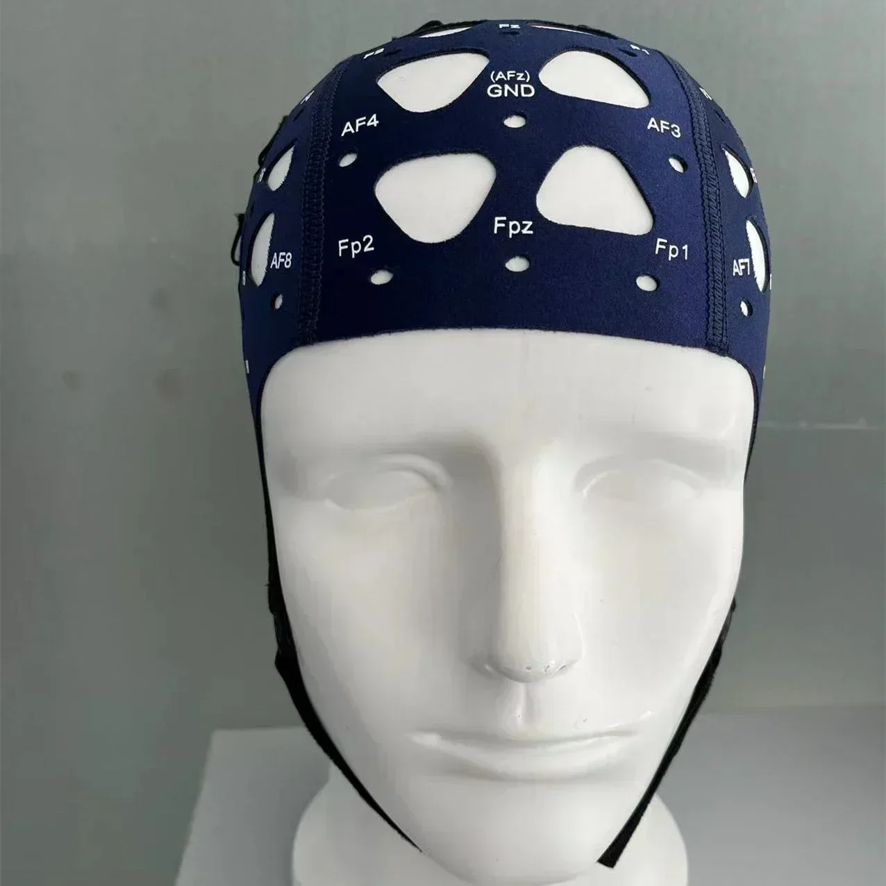 

Greentek Textile cap without electrodes for non-invasive EEG registration