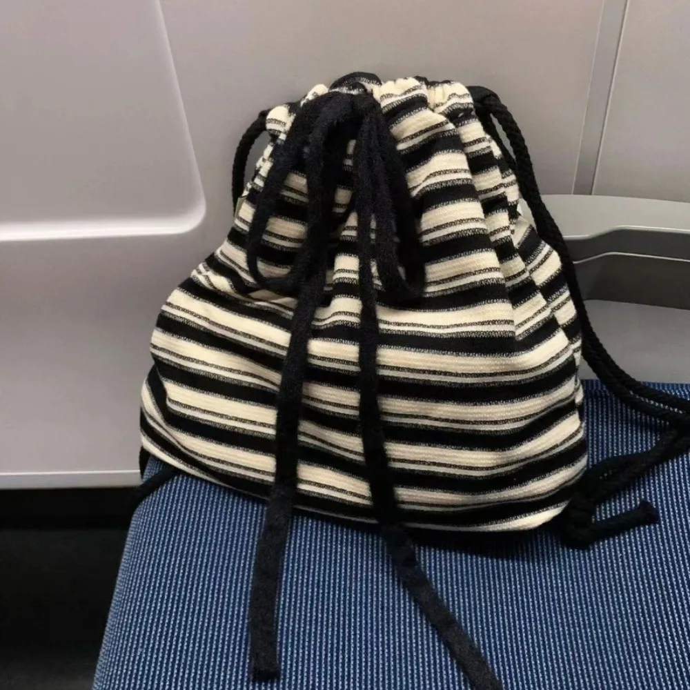 

High Quality Leisure Striped Backpack Color Contrast Soft Commuting Bag Simple White& Black Drawstring Backpack Travel