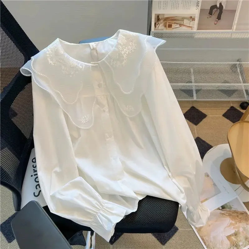 

Double Layered Lace and Lace Doll Collar Shirt Niche Loose Sweet Anti-aging Flared Long Sleeved Top