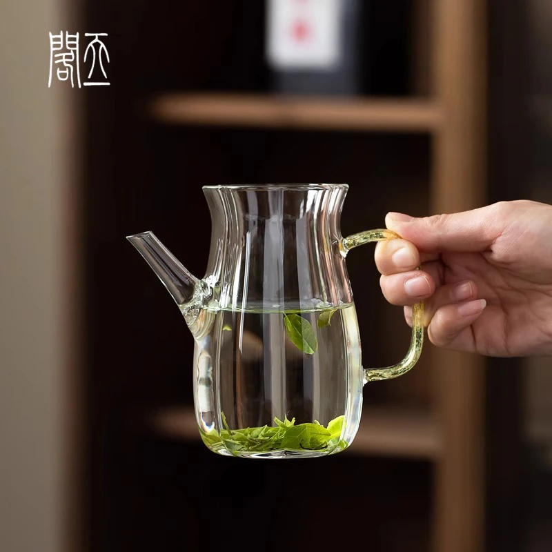 

Translucent Heat Resistant Glass Tea Pot with Side Handle for Brewing een Tea Includes Public Cup for Home Use