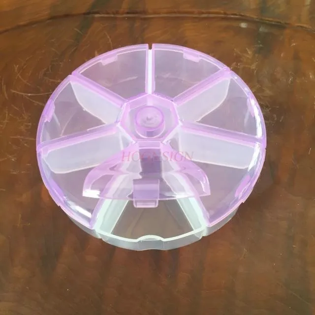 

Portable 7-grid small medicine box, mini medicine storage box, sealed portable medicine box