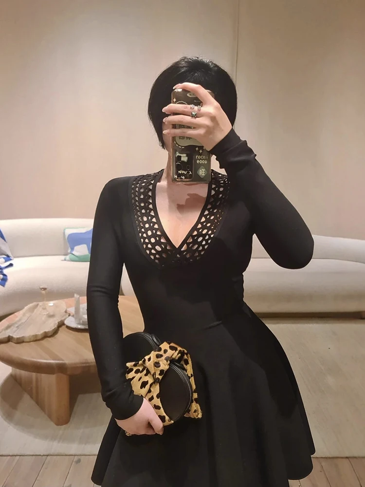 

Hollow-out flower V-neck knitted dress simple and versatile long-sleeved puffy women's dress spring 2026 new