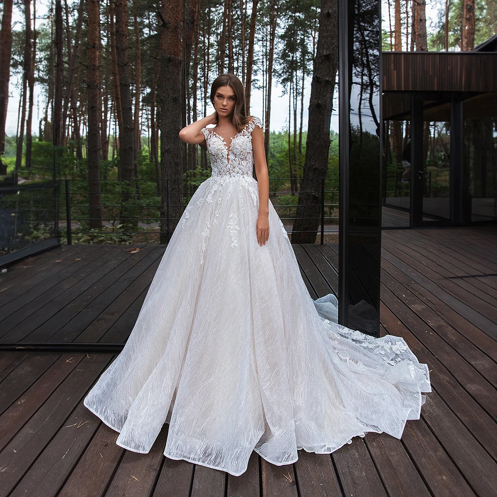 

Elegant Appliques Lace Tulle Sheer Neck Sleeveless Wedding Dress for Women A-line Backless Court Wedding Party Gown