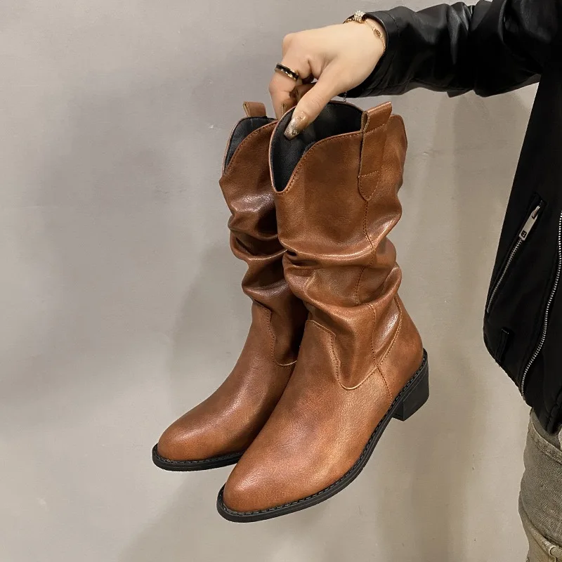 

Женские сапоги до середины икры. Дизайнерские плиссированные кожаные сапоги. Ковбойские сапоги в стиле вестерн на массивном каблуке. Острые сапоги челси для женщин. Рыцарские сапоги.