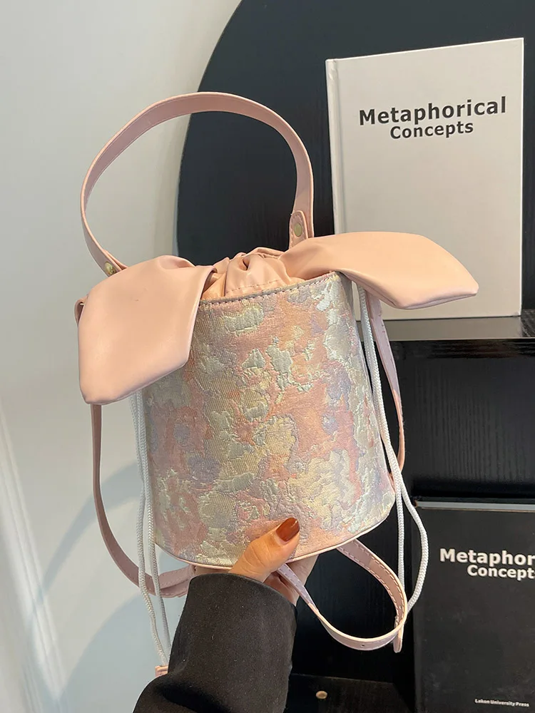 

Elegant Canvas Printed Bucket Bag 2024 Spring Chic Drawstring Bow One Shoulder Crossbody Bag Women Fashion Versatile Handbag