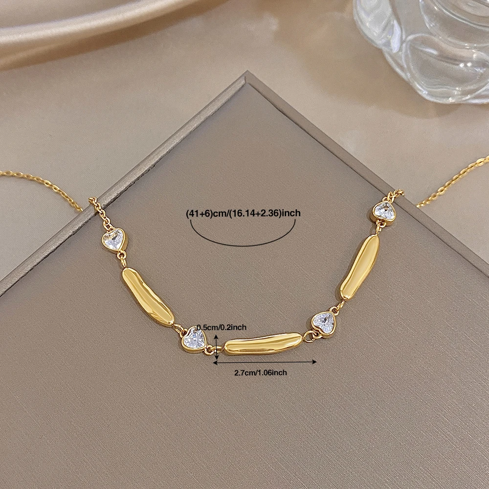 AENSOA Damen Halskette aus Edelstahl in Goldfarbe, lange, zierliche Halskette mit Herz-Zirkon-Verzierung, klassisches Schmuckstück für Partys, Geschenk. – Detail 6