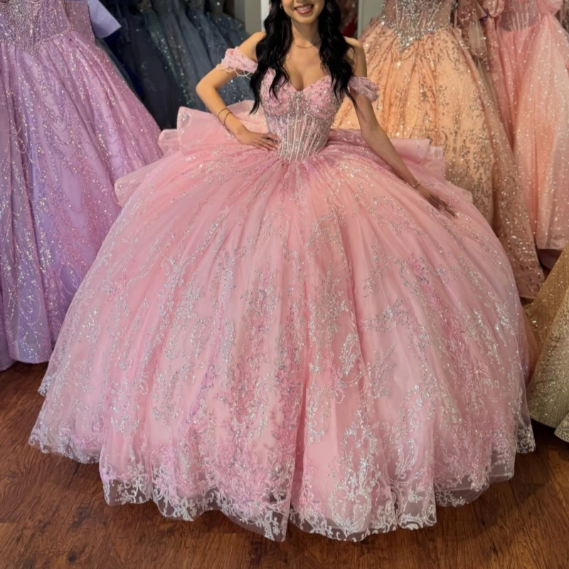 

Pink Shiny Ball Gown Quinceanera Dresses 2026 Sequin Applique Lace Beading Crystal Bow Tull Off Shoulder Sweet 16 Dress Years