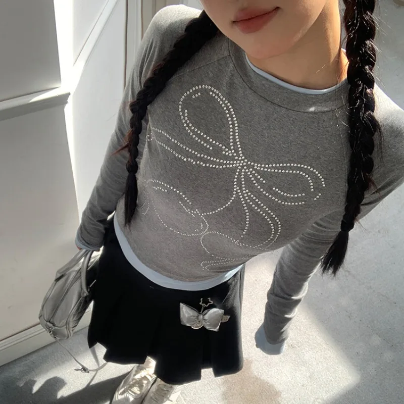 

Fake Two-piece Patchwork O-neck Sexy Slim Long-sleeved T-shirt Women 2025 Autumn New High Street Bow Printed Casual Tops