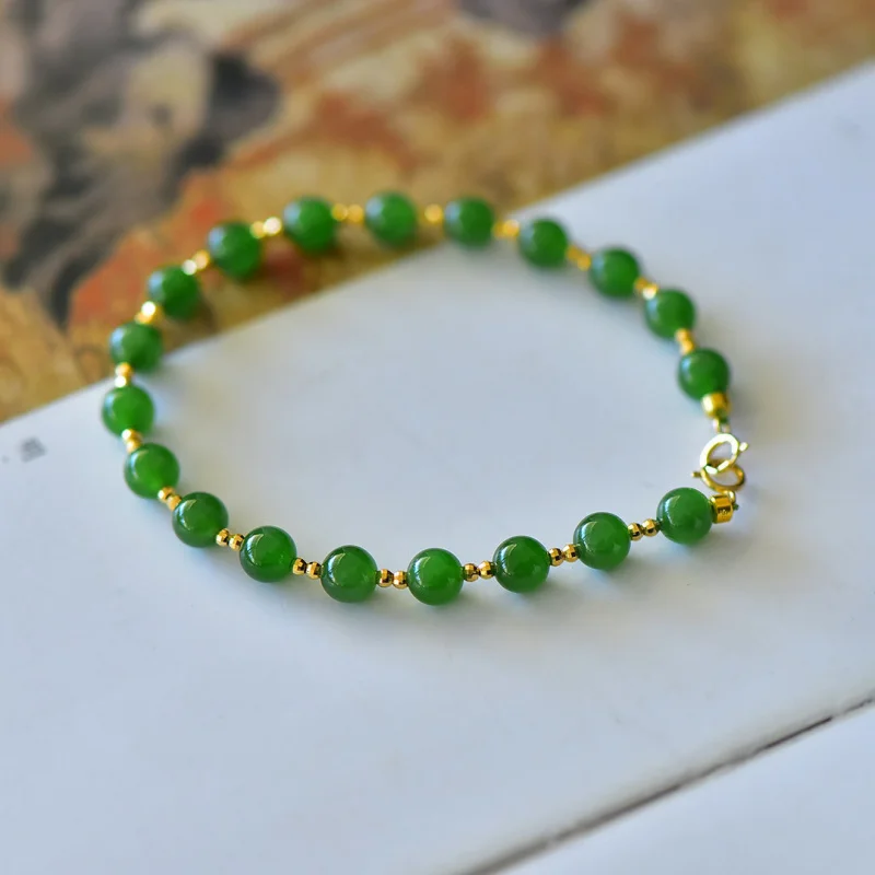 

Браслет из натуральной яшмы с круглыми бусинами, двойной кольцевой застежкой из 18-каратного золота и аксессуарами из бисера