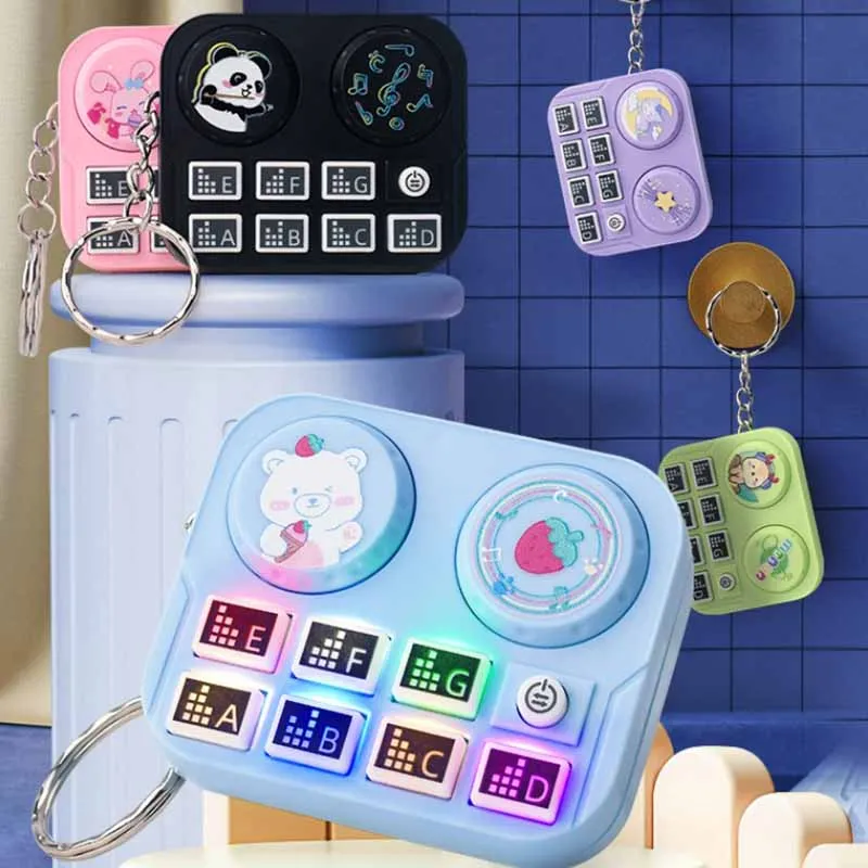 Porte-clés pendentif de lecteur de disque de musique de dessin animé créatif, mini machine de jeu électronique émettant de la lumière, jouets pour enfants