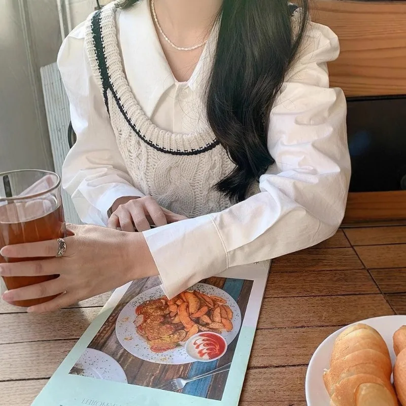 เสื้อเชิ้ตสไตล์ฝรั่งเศสสำหรับผู้หญิง เสื้อแฟชั่นฤดูใบไม้ผลิและฤดูใบไม้ร่วง แขนพอง คอแหลม ดีไซน์เก๋ไก๋