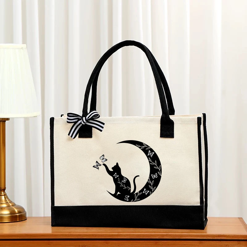 Small black cat pattern handbag under the moon, fashionable canvas handbag, portable shopping bag beach bag, large capacity