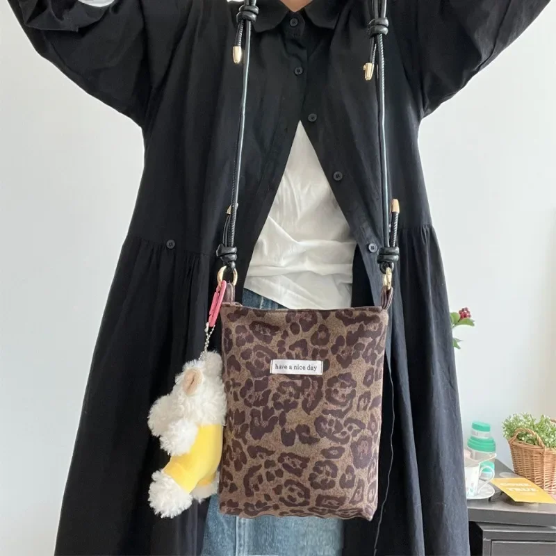 Fashionable Leopard Print Canvas Phone Bag for Girls with Adjustable Shoulder Strap Versatile Mini Messenger Bag view 2