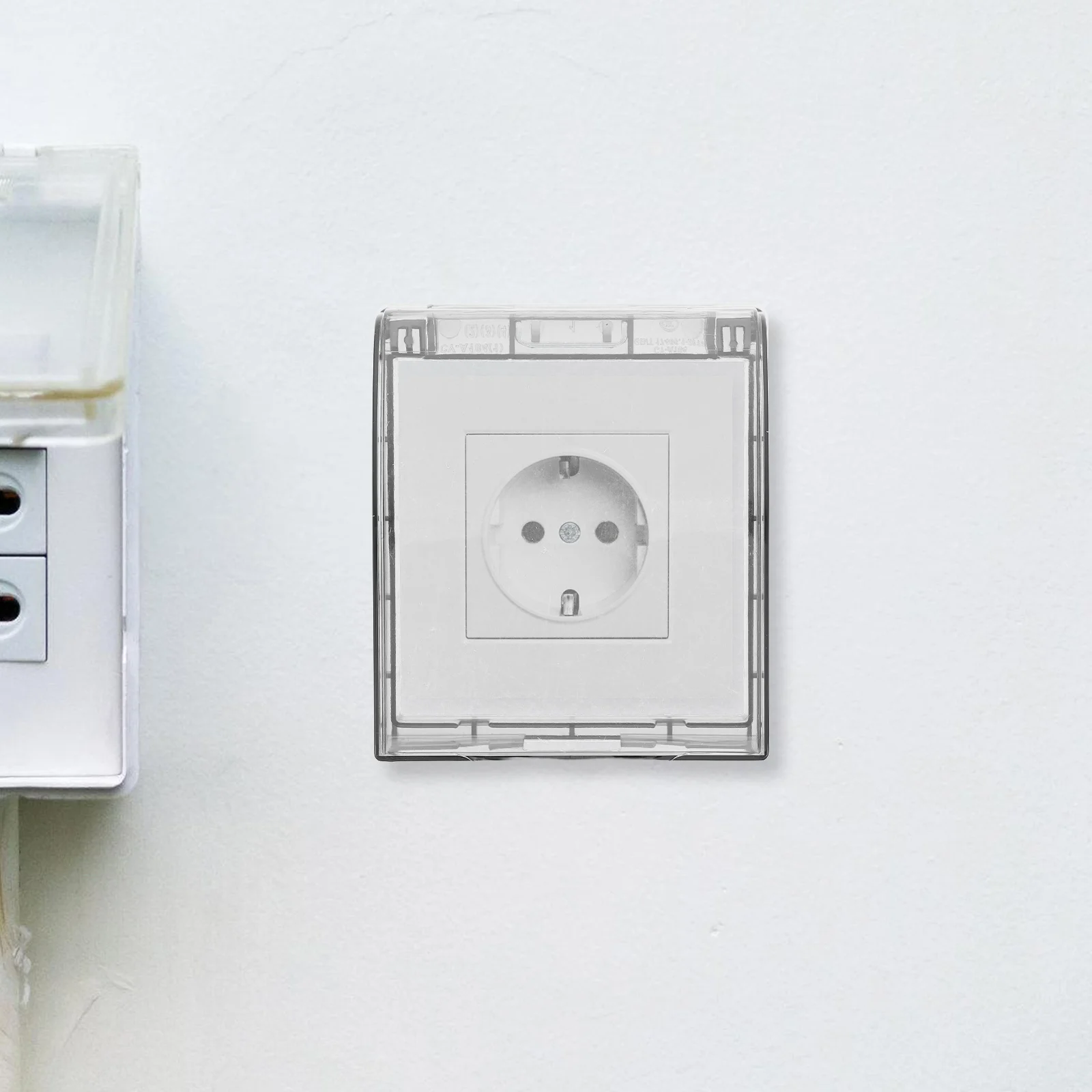 Osłona gniazda zabezpieczająca Wodoodporna skrzynka gniazdka Elektryczny wyłącznik Pyłoszczelna osłona kuchenna Przeciw smalcowi Osłony gniazdka ściennej