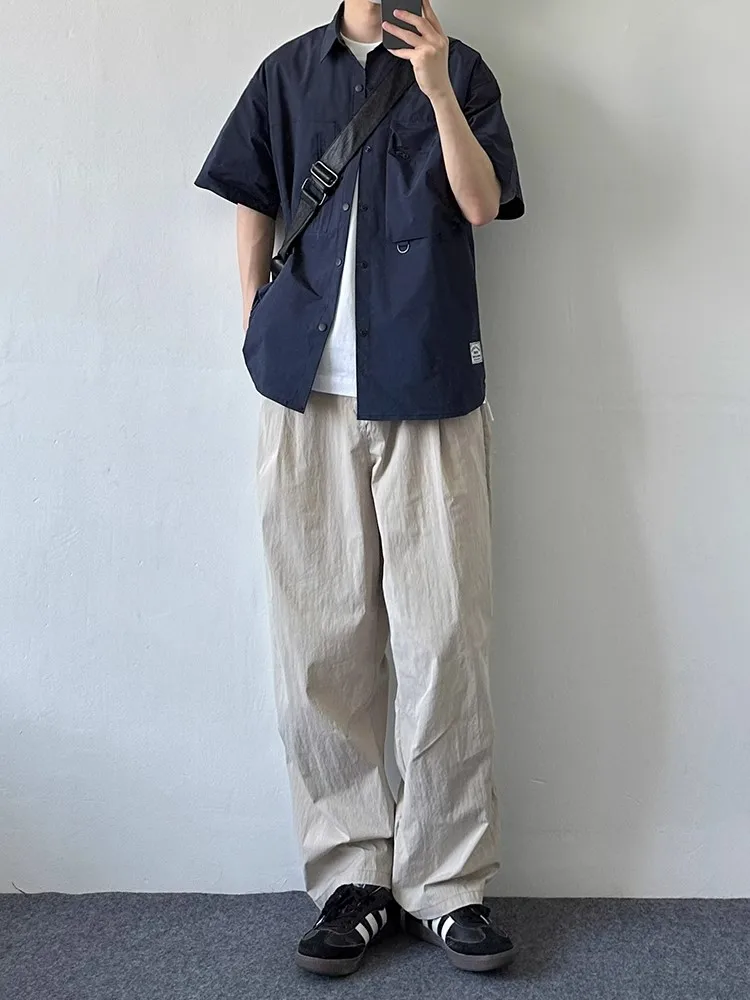 قميص عمل أمريكي عتيق الطراز بأكمام قصيرة، فضفاض، غير رسمي، مناسب للجنسين، تصميم صيفي جديد، جاكيت قميص بأكمام نصفية