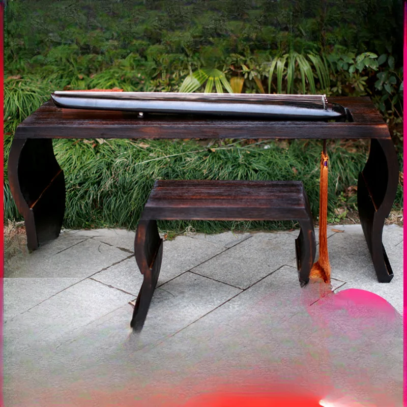 

One-piece solid wood thickened and widened teaching double guqin table