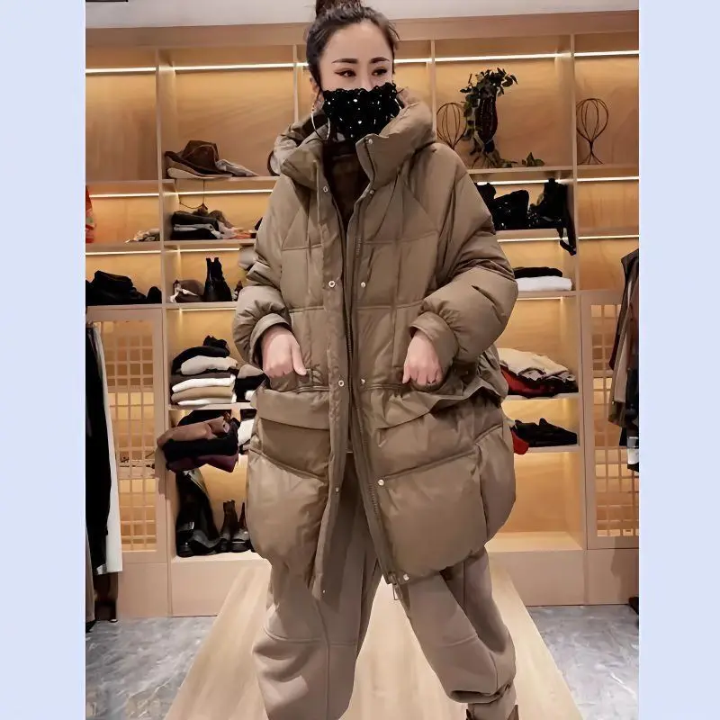 Pato branco para baixo jaqueta feminina anti-temporada especial nova moda solta médio e longo engrossado quente com capuz design de cor sólida