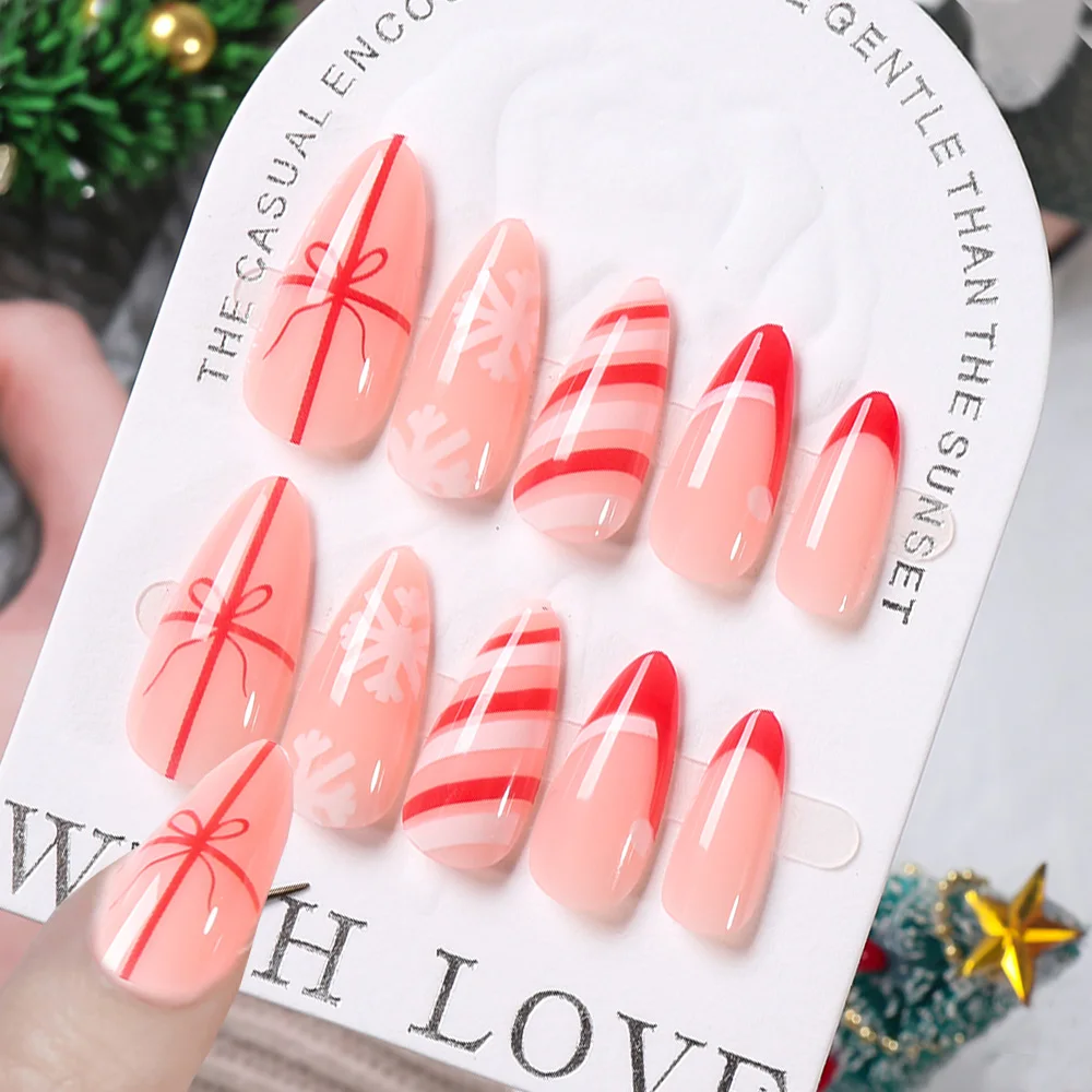 

24pcs Pink Almond press on nail tips Christmas Red Bows White Snowflake Fake Nails Press on Oval False Nails for Women Holiday%^