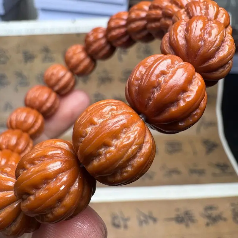Hand-carved , large Beijing-style octagonal monkey head walnuts, single-strand bracelet 14 beads
