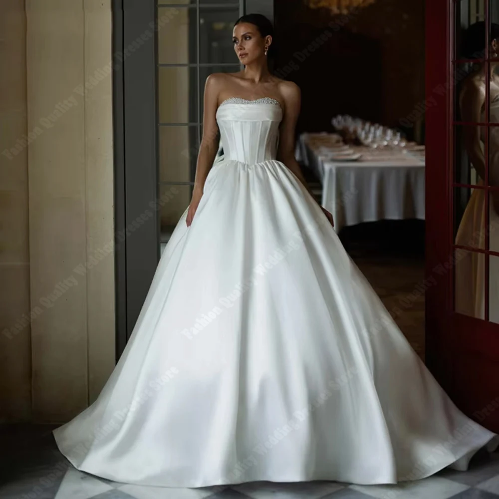 

Sweetheart Collar Sleeveless Satin Women Wedding Dresses Sexy Backless Bride Gowns Mopping Length Princess Prom Gowns Customized