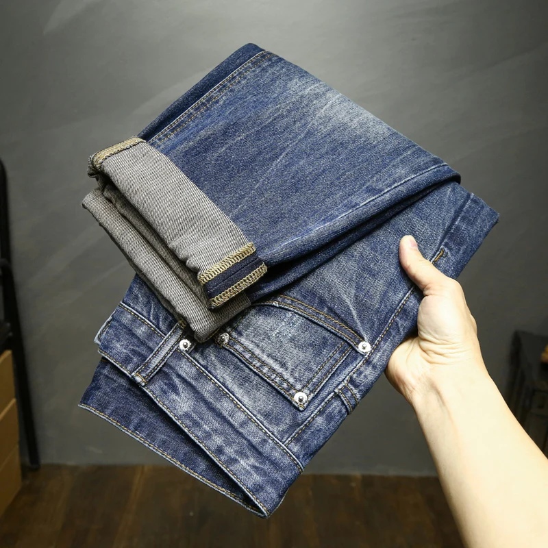 Jeans Hip Hop a gamba larga da uomo pantaloni larghi Harem vestibilità ampia Jeans corti da uomo strappati in cotone blu scuro Kpop Patchwork Distressed