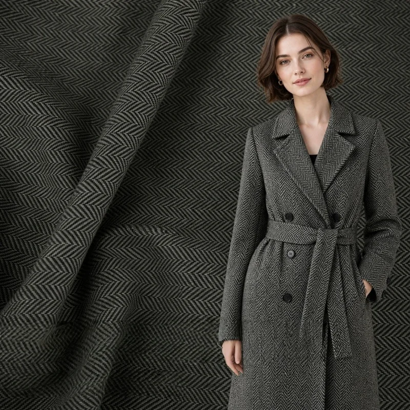 2Code: tejido de lana tipo tweed con estampado de espiga en color negro y gris, ideal para confeccionar ropa, abrigos, prendas de abrigo y trajes; un diseño