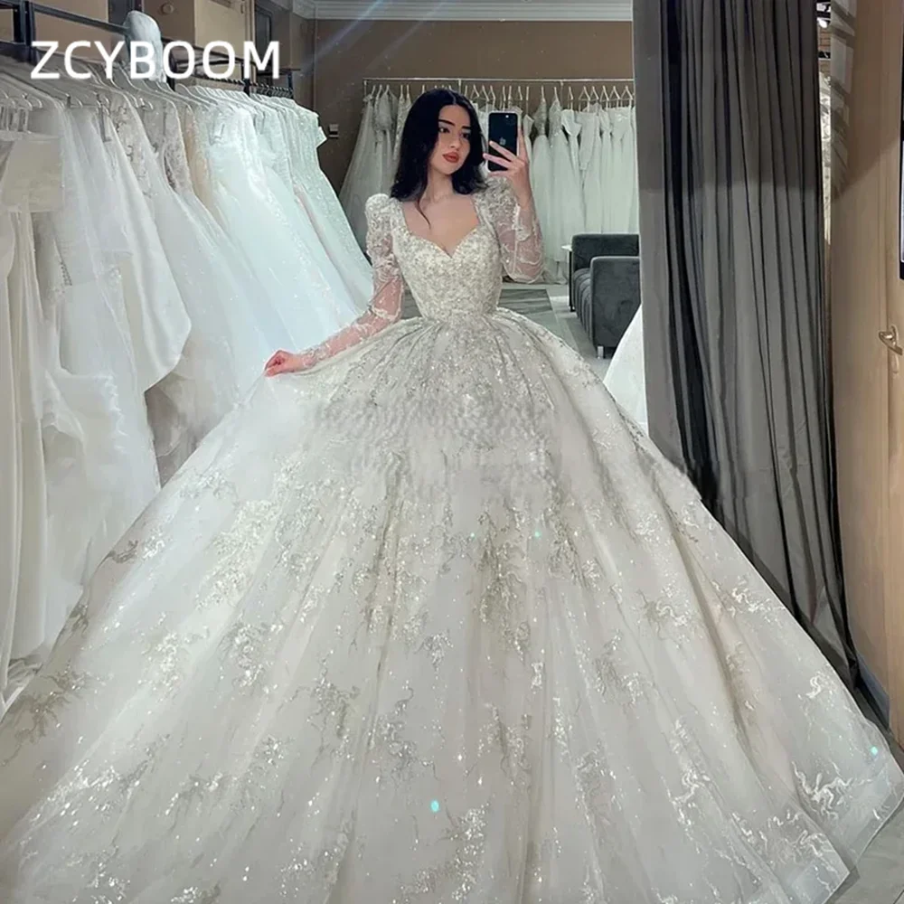 Customized Luxury Sweetheart Long Sleeves Ball Gown Wedding Dress Sequined Sparkly Appliques 2026 Bridal Gown With Sweep Train