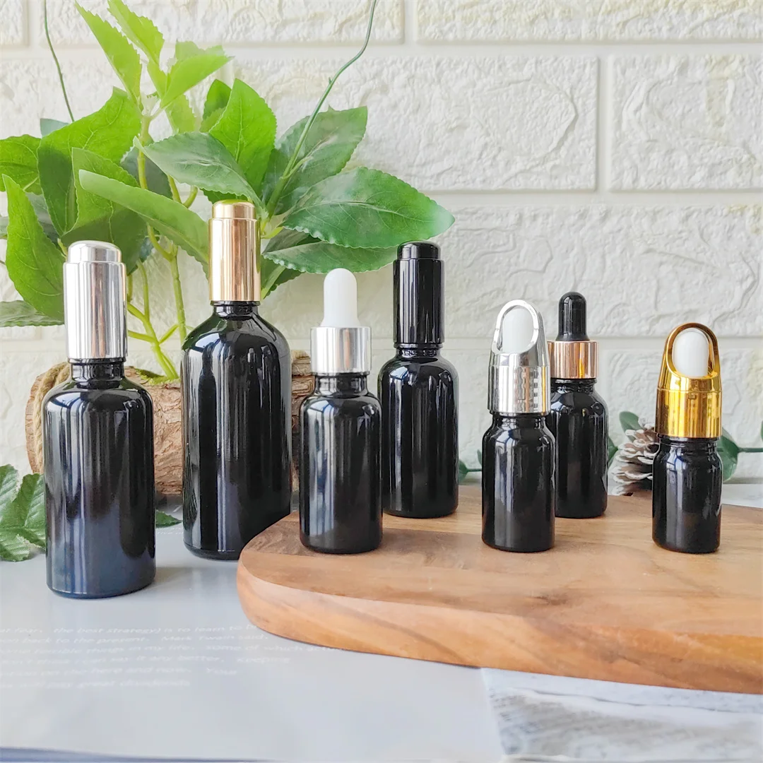 

Wholesale 5ml 10ml 15ml 20ml 30ml 50ml 100ml Empty Cosmetic Skin Care Essential Oil Essence Packaging Black Glass Dropper Bottle