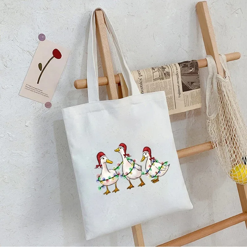 

Funny Merry GoosemasSanta Hat Large Capacity Canvas Shoulder Handbag Eco-Friendly Tote Bags Reusable Shoulder Bag Grocery Bag