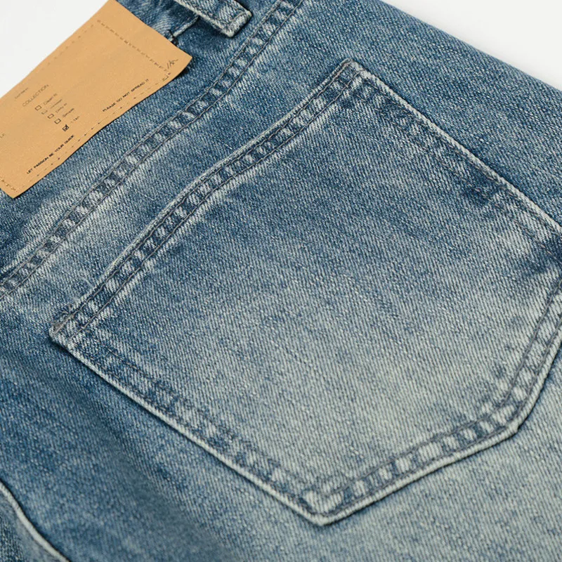 جينز كلاسيكي أمريكي للرجال للربيع والخريف، سروال كاجوال فضفاض ومغسول باللون الأبيض المصقول في الشارع