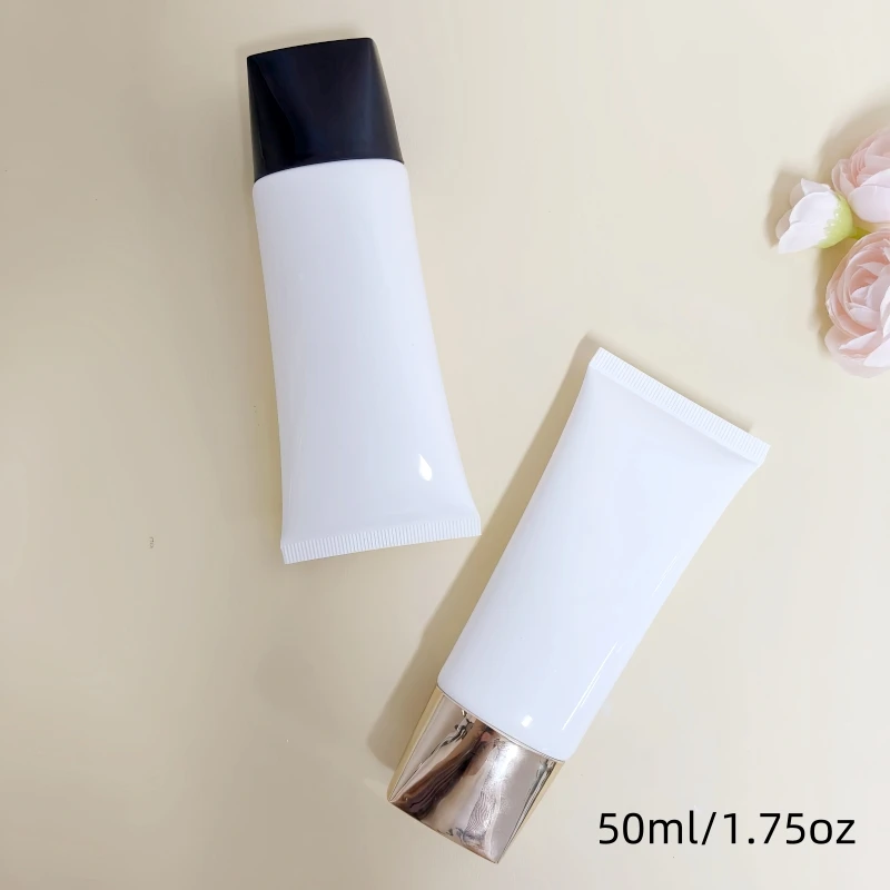 6 ชิ้น 50 กรัม บรรจุภัณฑ์สกินแคร์แบบหลอดเปล่าทรงแบน สีดำทอง ฝาปิดทรงแบนสีขาว ทรงแบนรูปไข่  ขายตรงจากโรงงาน