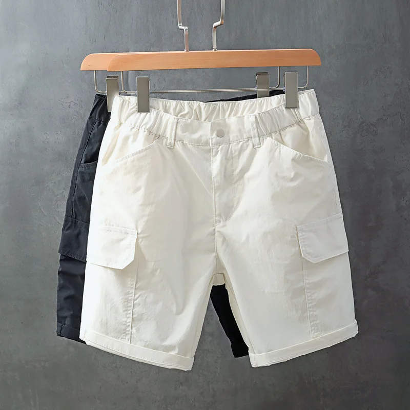 

Летние мужские шорты2025Новые модные белые повседневные шорты Свободная тонкая рабочая одежда Универсальные пляжные шорты с пятью точками