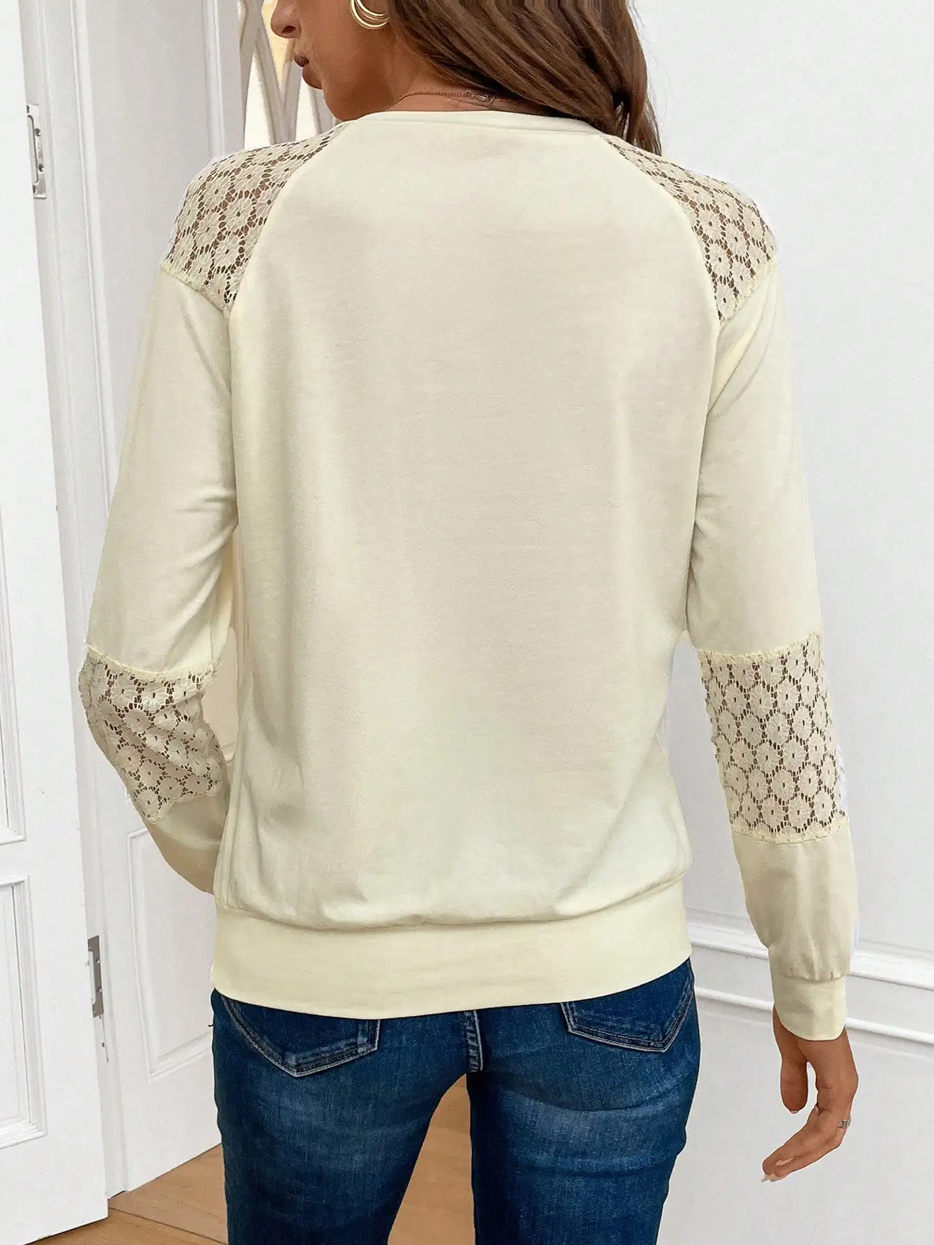 Europe and the United States new round neck long sleeve lace decoration patchwork loose temperament of women T-shirt