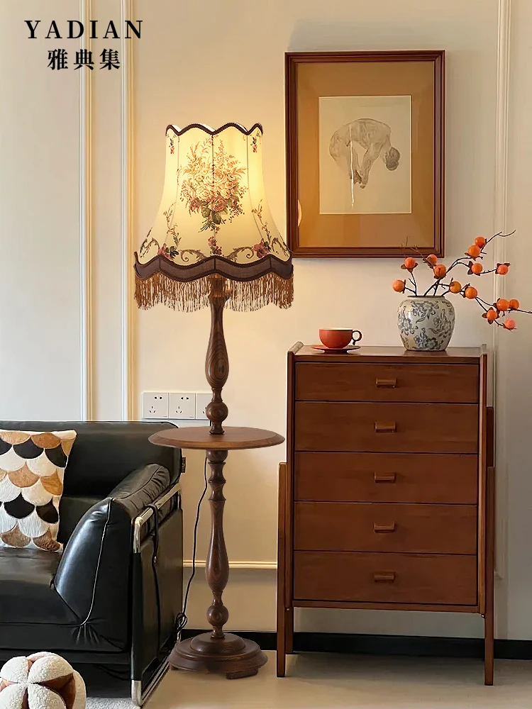 

French retro living room floor lamp next to the sofa Internet celebrity high value vertical shelf American bedroom ambient light