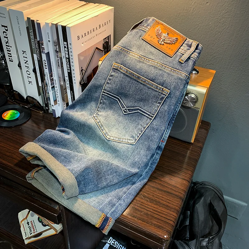 Pantaloncini di jeans da uomo estate sottile e tutto abbinato Casual semplice moda Design avanzato pantaloni Capri elasticizzati arricciati retrò spazzolati