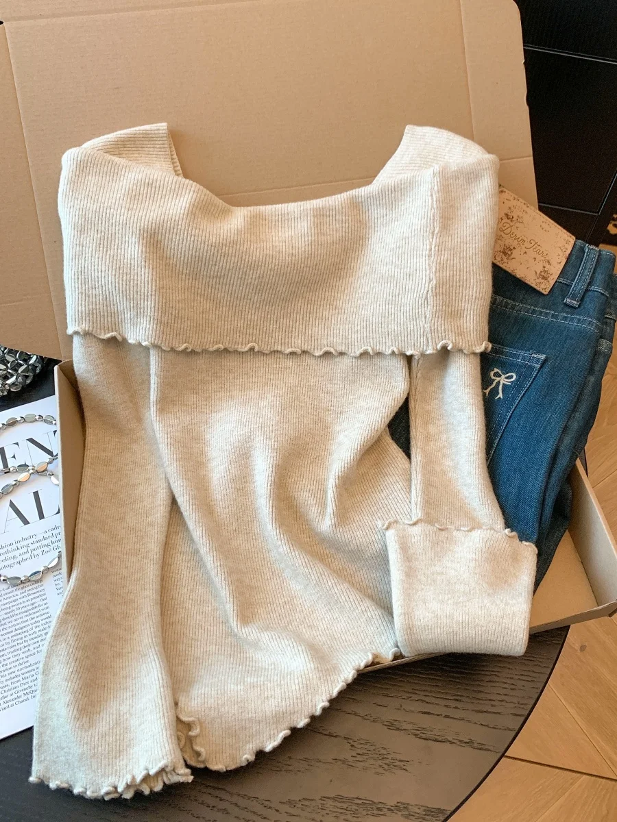 เสื้อถักไหมพรมสำหรับเด็กผู้หญิง ทรงปล่อยชายเสื้อไม่เท่ากัน คอเหลี่ยม ผูกโบว์ แขนยาวทรงบาน นุ่ม ระบายอากาศได้ดี หลายสี