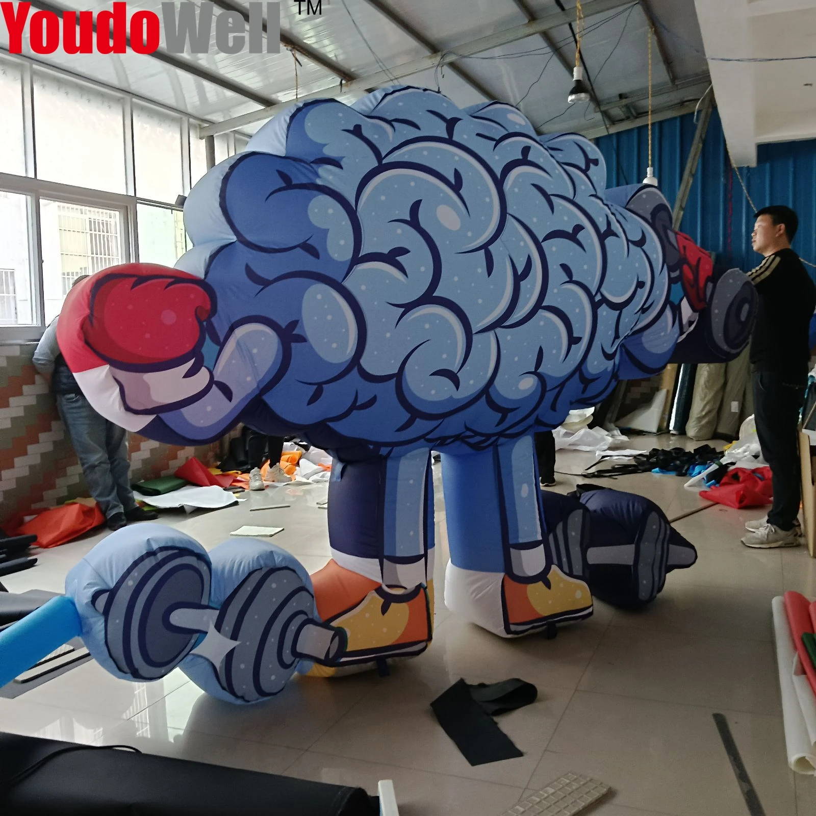 Cartoon of inflatable brain lifting dumbbells