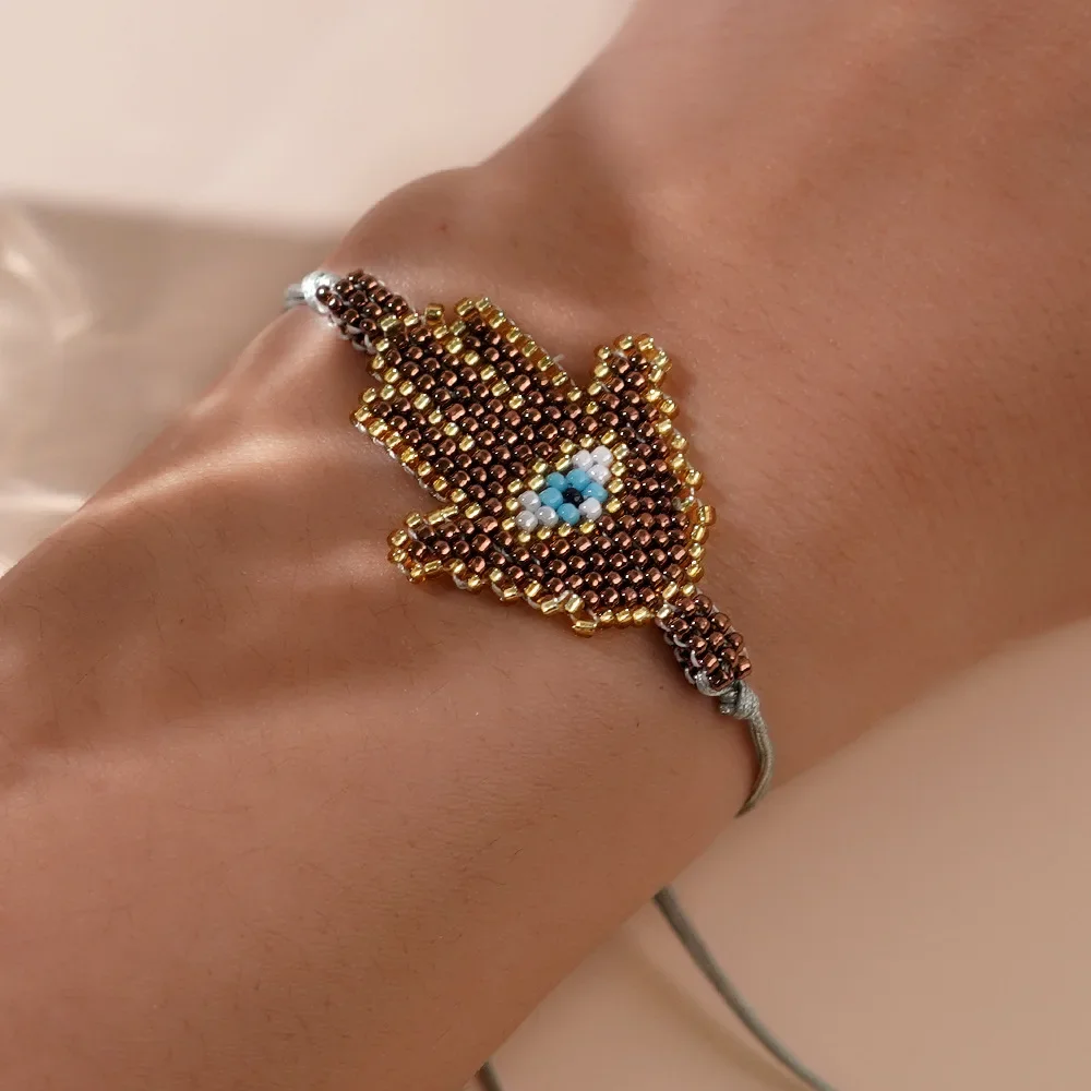 

Rice bead bracelet Devil's hand Design Originality Hand knitting Bohemia Adjustable Fashion Female Simple Beaded bracelet