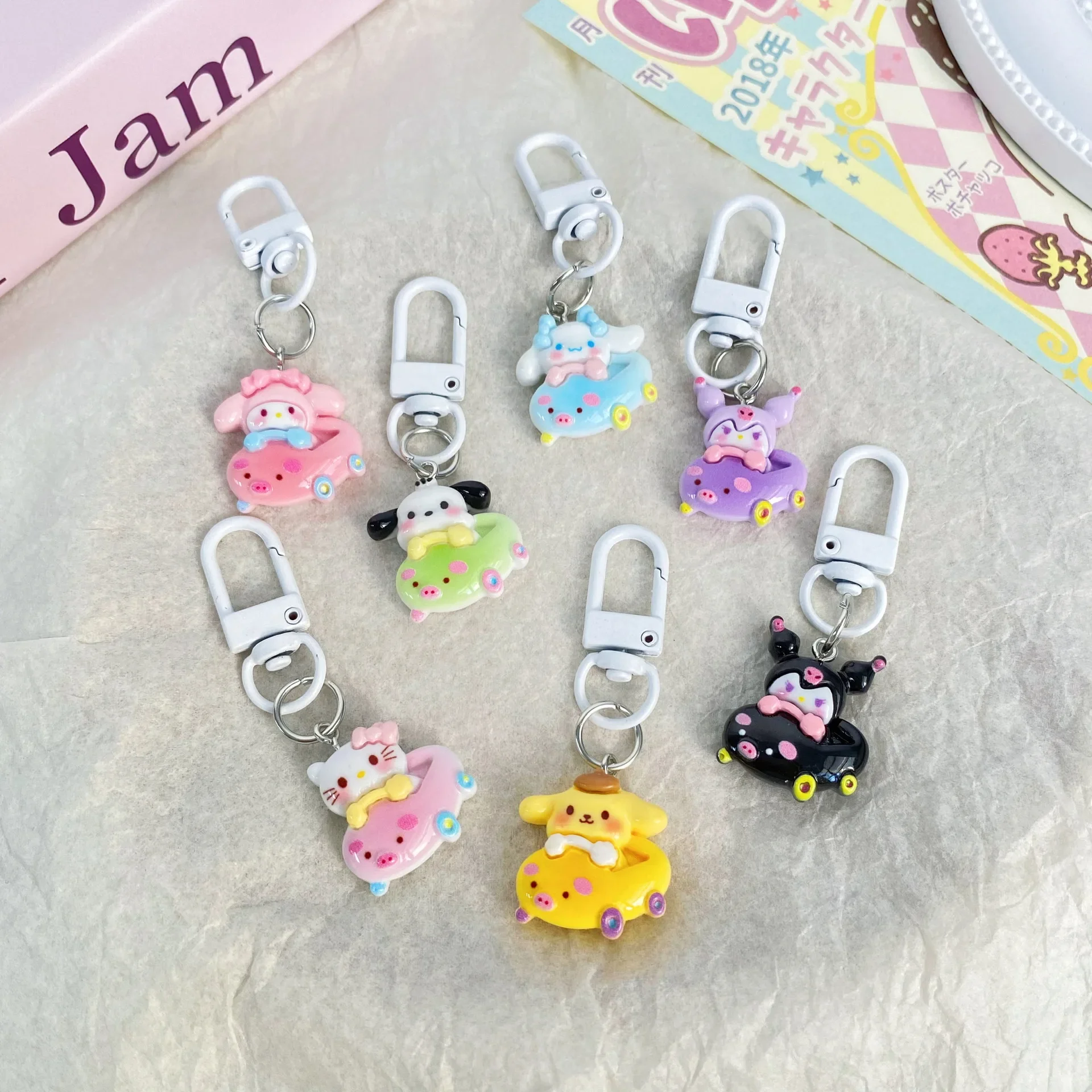 New Sanrio Figure Driving Car Series Keychain Kawaii Cinnamoroll Pochacco Glossy Resin Key Chain Girls Kids Backpack Accessories