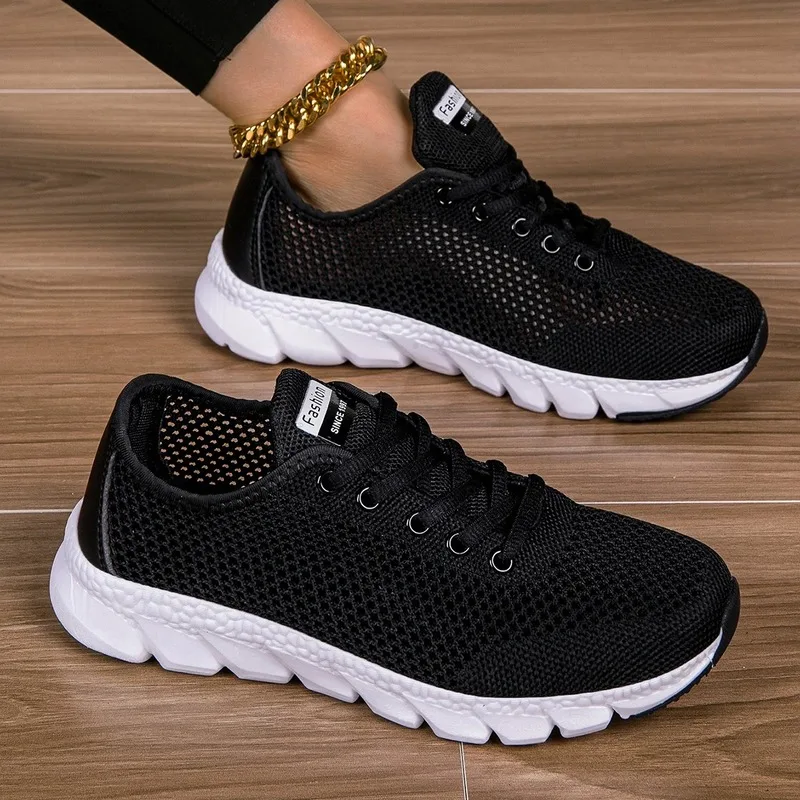Black mesh lace - up fashion sneakers