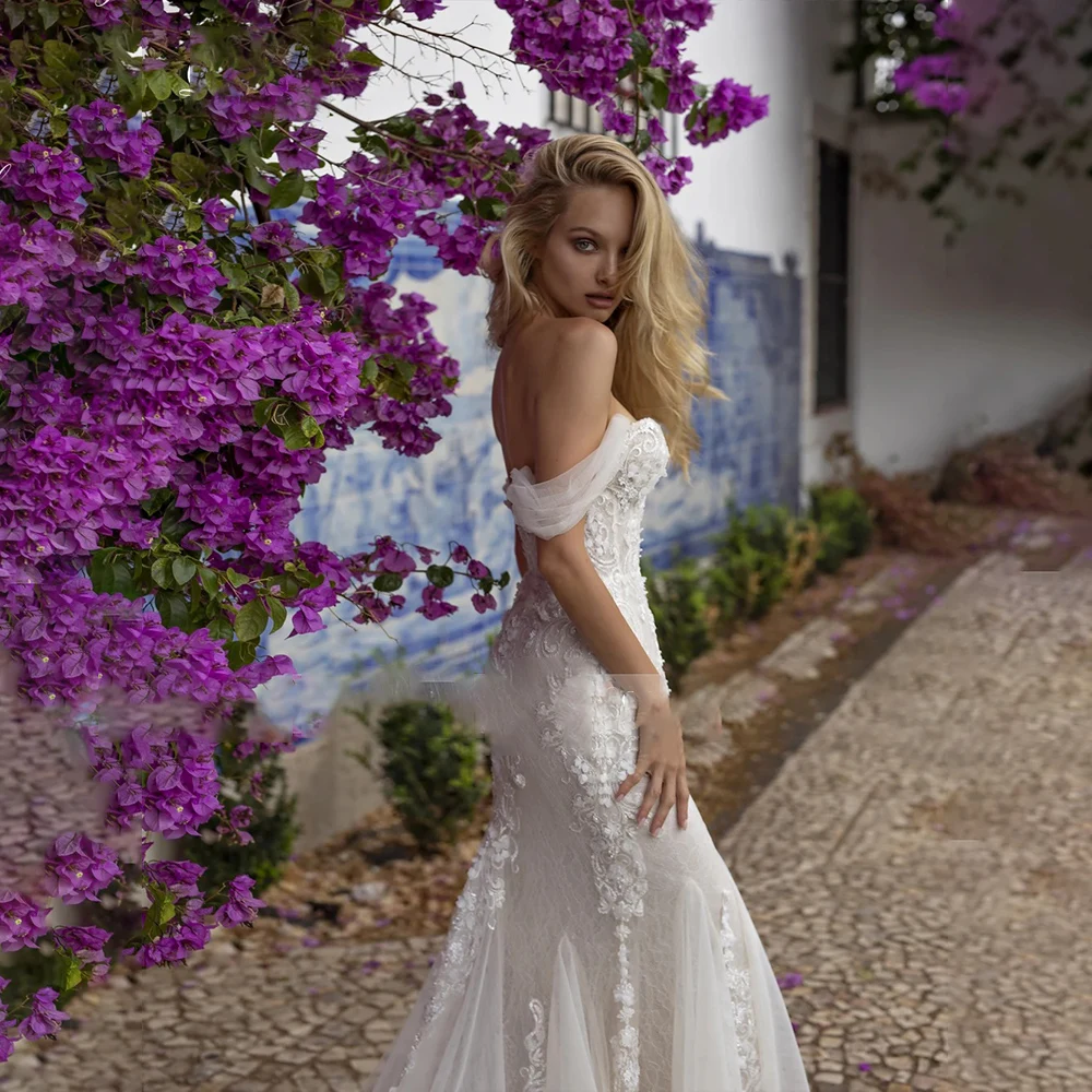 Abito da sposa sexy a sirena per abito da sposa senza spalline in pizzo senza maniche da donna Abiti personalizzati di alta qualità