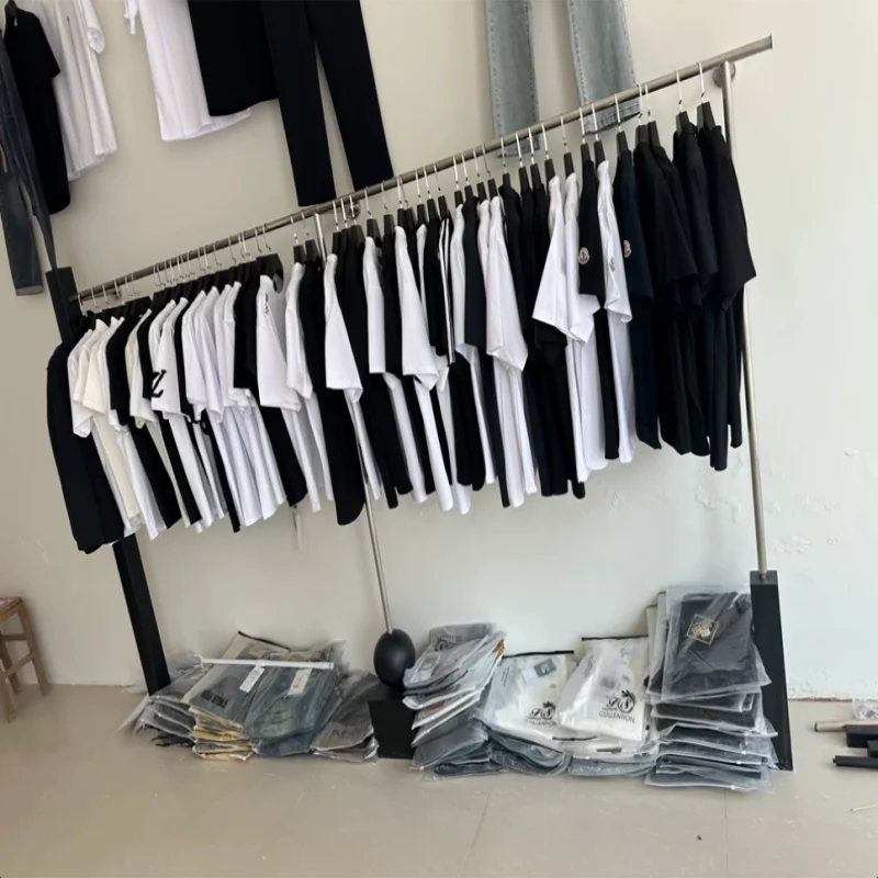 

Настенные витринные стеллажи из нержавеющей стали Nano Gold для женской одежды, специализированные полки для модной розницы