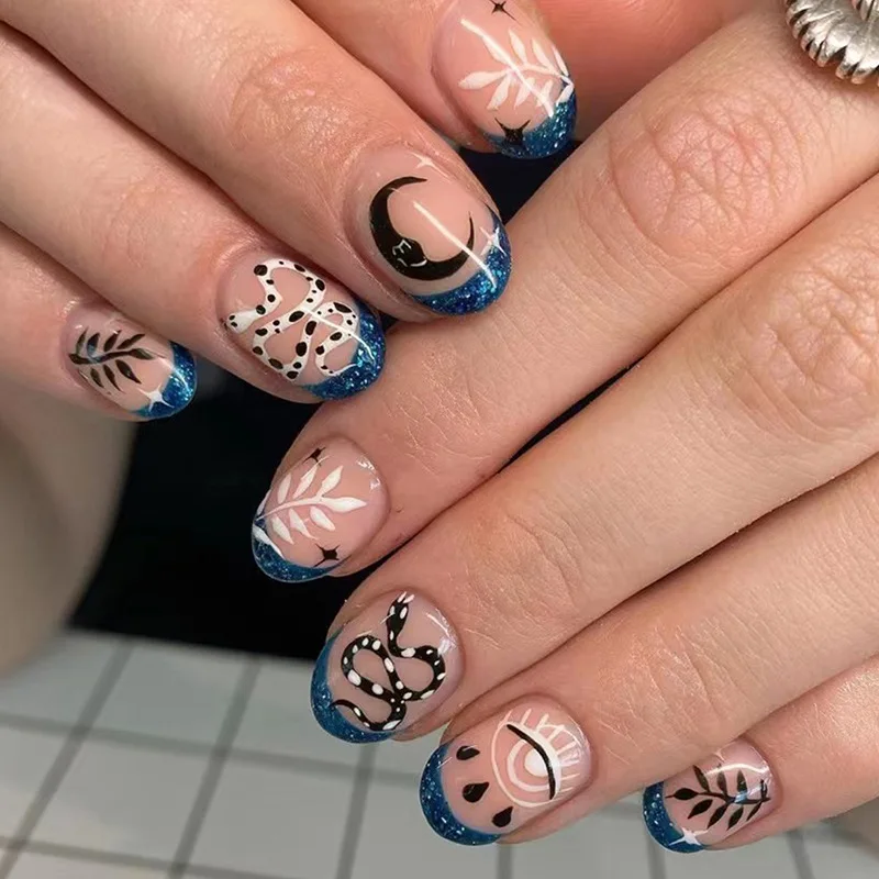 

24pcs Press-On Nails - Blue Glitter Borders With Black/White Snake & Leaf Designs Short Oval Edgy Glam Style