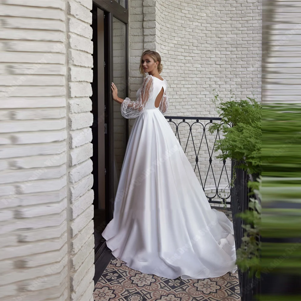 Eleganckie seksowne suknie ślubne bez rękawów dla kobiet Sweetheart A-Line suknie ślubne pełne wdzięku mopem długość księżniczka Vestidos De Novias