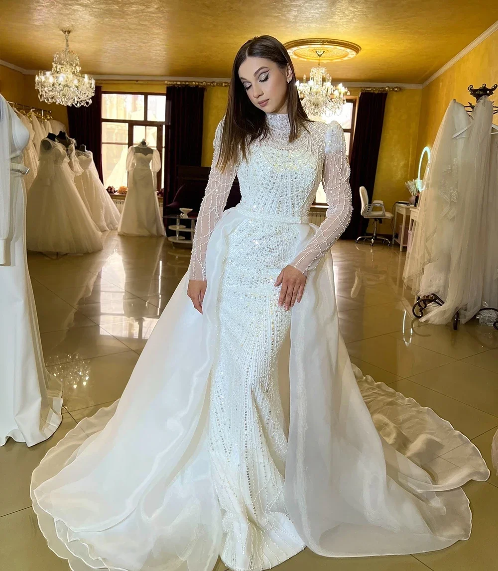 NymphElegant 진주 장식 인어 신부 드레스 탈부착 가능한 트레인 럭셔리 하이넥 긴 소매 오버 스커트 웨딩 가운 맞춤 제작