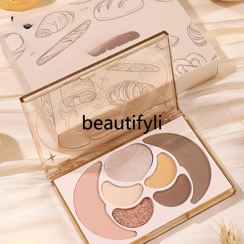 Seven-color eyeshadow disc, chestnut croissant high-gloss earth-tone matte grooming blush, facial comprehensive disc.